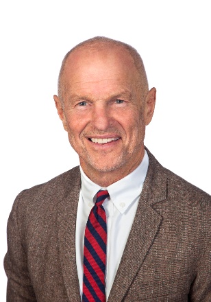 A person in a suit and tieAI-generated content may be incorrect.